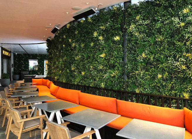 interior design for bar area including artificial green wall