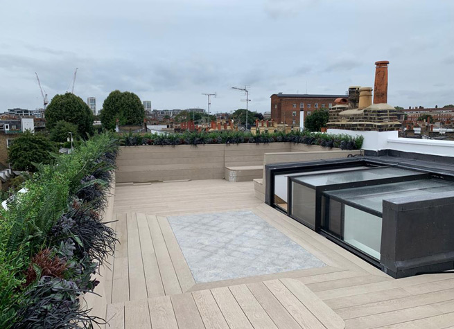 designer roof terrace garden with artificial plants