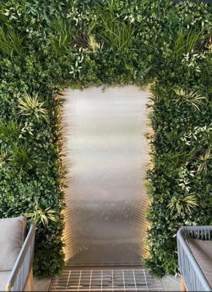 artificial green wall with water feature